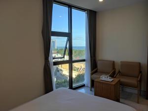 Postel nebo postele na pokoji v ubytování HỒNG HẢI 2 HOTEL