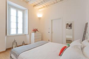 Posteľ alebo postele v izbe v ubytovaní Wine Not Apartment in Como City Centre