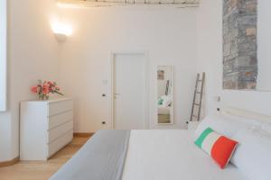Posteľ alebo postele v izbe v ubytovaní Wine Not Apartment in Como City Centre