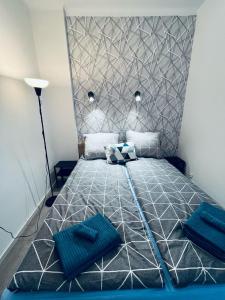 Posteľ alebo postele v izbe v ubytovaní Apartament Blue Shell - Gdynia Centrum