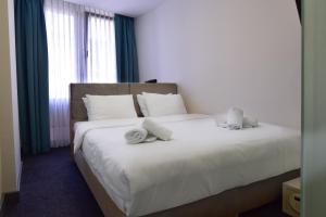 Postel nebo postele na pokoji v ubytování Taksim Hotel V Plus