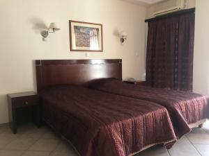 Voodi või voodid majutusasutuse Plaza Hotel toas
