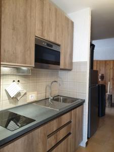 Kuchyň nebo kuchyňský kout v ubytování bb26 apartment mountain Lozio