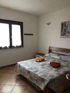 Postel nebo postele na pokoji v ubytování Veliero House