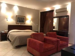 Postel nebo postele na pokoji v ubytování Plaza Hotel + 37 fotografií