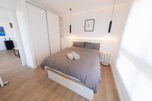 Posteľ alebo postele v izbe v ubytovaní AMAZING APARTMENT WITH STUNNING VIEWS