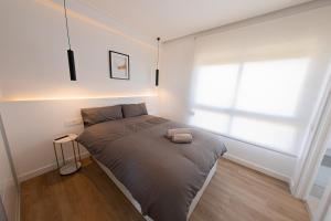 Posteľ alebo postele v izbe v ubytovaní AMAZING APARTMENT WITH STUNNING VIEWS