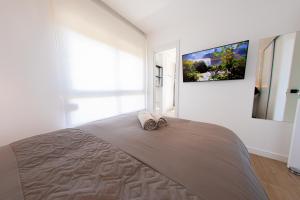 Posteľ alebo postele v izbe v ubytovaní AMAZING APARTMENT WITH STUNNING VIEWS