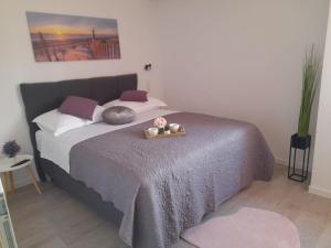 Postel nebo postele na pokoji v ubytování Apartments San Paulo