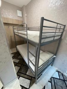 a bunk bed room with two bunk beds at De Luxe Studio Burgas, City Center in Burgas