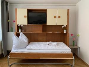 Postel nebo postele na pokoji v ubytování Ferienwohnung Nikolaiblick