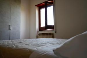Letto o letti in una camera di Atomos
