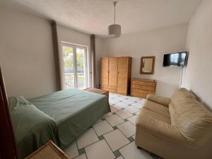 A television and/or entertainment centre at Casa Impagliazzo