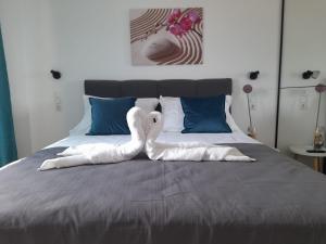 Postel nebo postele na pokoji v ubytování Apartments San Paulo