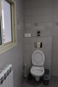 Koupelna v ubytování Eastside Suites
