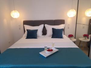 Postel nebo postele na pokoji v ubytování Apartments San Paulo