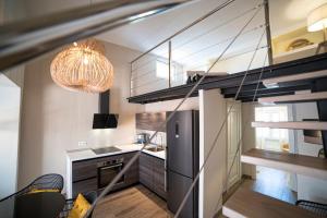 Kuchyň nebo kuchyňský kout v ubytování Little Loft PlayaBlanca + 26 fotografií