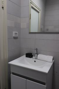 Koupelna v ubytování Eastside Suites