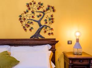 Tempat tidur dalam kamar di Cascina Gazzeri Country House