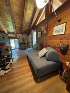 A bed or beds in a room at Maison de Noé