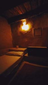 A bed or beds in a room at NaInshal Siwa