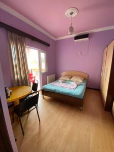 Postel nebo postele na pokoji v ubytování Villa Jakos Paradise