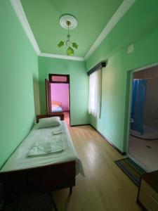 Postel nebo postele na pokoji v ubytování Villa Jakos Paradise