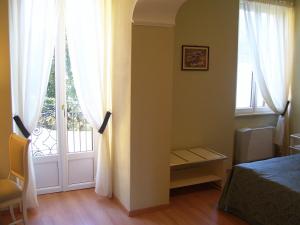 Postel nebo postele na pokoji v ubytování Villa La Mirabella