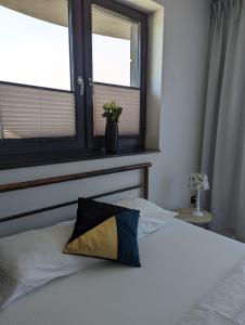 Postel nebo postele na pokoji v ubytování Sunset Beach