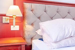 Postel nebo postele na pokoji v ubytování Hotel Dalmacija