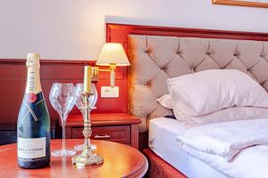 Postel nebo postele na pokoji v ubytování Hotel Dalmacija