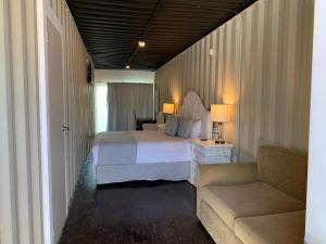 Container Inn Hotel Aeropuerto客房内的一张或多张床位