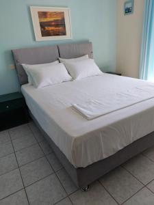 En eller flere senge i et værelse på La Casa Di Nonna