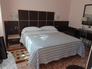 Cama o camas de una habitación en Hotel Castelletto