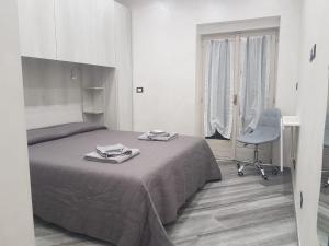 Lova arba lovos apgyvendinimo įstaigoje Appartamento in Piazza Vittorio Veneto con parcheggio, Torino