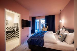 Posteľ alebo postele v izbe v ubytovaní Sport Hotel Passo Carezza