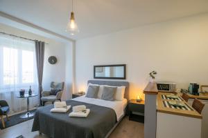 מיטה או מיטות בחדר ב-Polai Panorama Apartments with FREE Parking