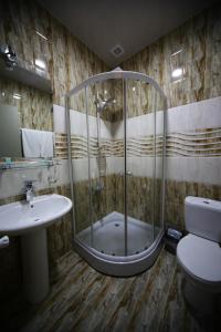 Ванная комната в Discovery Hotel