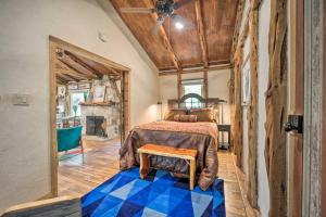 a bedroom with a bed and a wooden ceiling at Unique Stay Historic Home Along Blanco River in Blanco