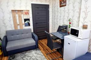 A kitchen or kitchenette at Csillag Apartman