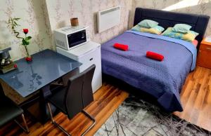 A bed or beds in a room at Csillag Apartman