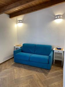Posezení v ubytování Casa bouganville Vignola Mare