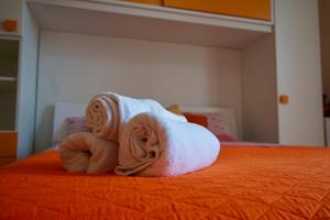 A bed or beds in a room at B&B Milena