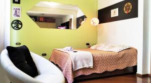 Ένα ή περισσότερα κρεβάτια σε δωμάτιο στο Acomodação-Viasoft-UP-Ecoville-INC-FioCruz-CIC
