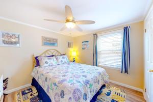 Montego Bay - 197 Pine Tree Road客房内的一张或多张床位