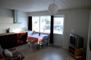 TV a/nebo společenská místnost v ubytování Henne Strand Ferie Accommodation