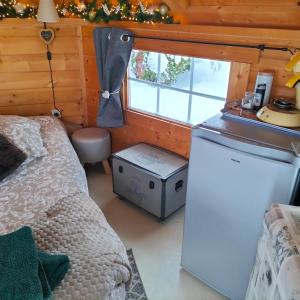 Kuchyň nebo kuchyňský kout v ubytování Cabane des lutins - Belle Fleur