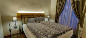 Postel nebo postele na pokoji v ubytování Hôtel St-Georges Romont