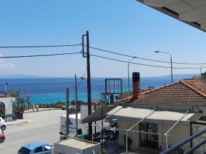 a view of the ocean from a house at Johny's Studios in Kallithea Halkidikis