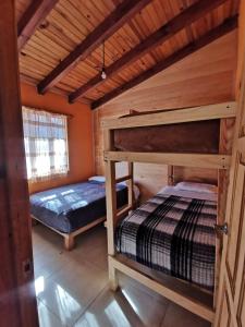 Postel nebo postele na pokoji v ubytování Los Pirineos